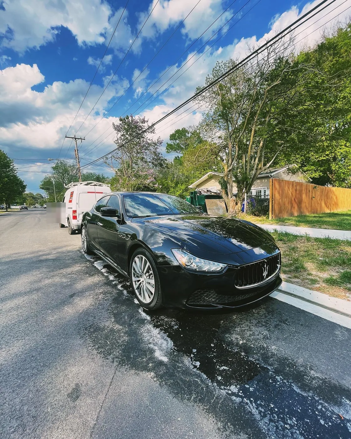 Black Maserati sedan after exterior detailing